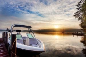 Sun and mist on a boat dock at sunrise