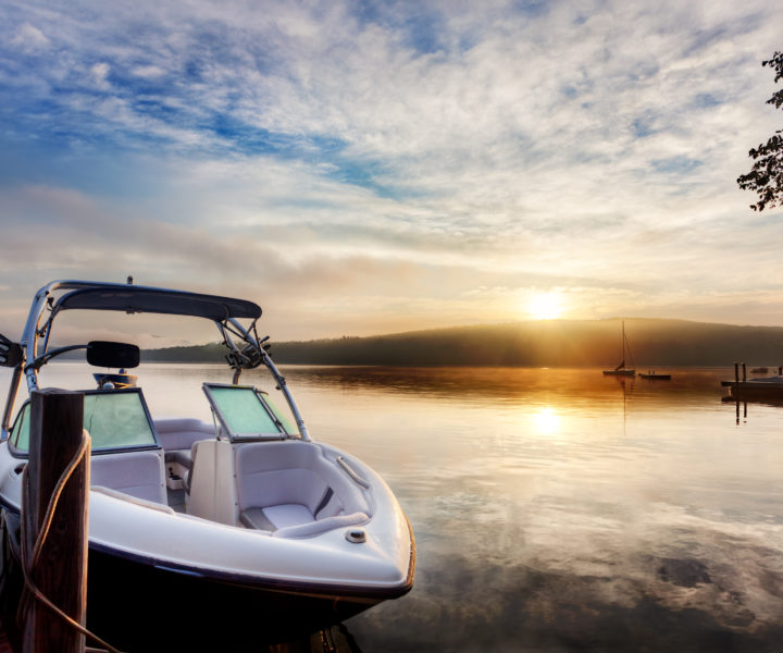 Sun and mist on a boat dock at sunrise