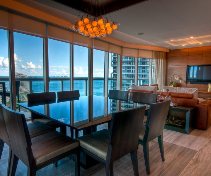 Inside view of a modern apartment with view to the bay.